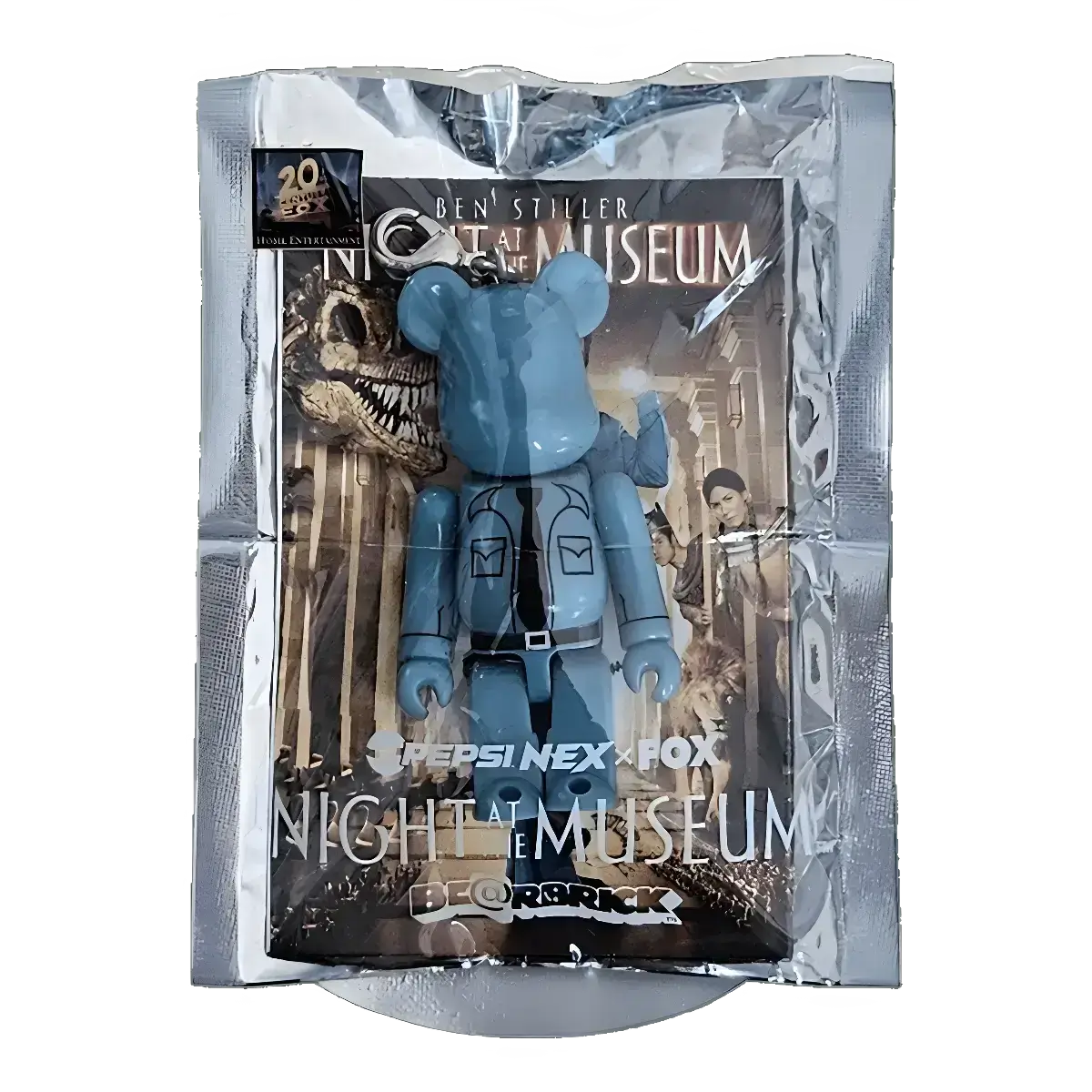 Bearbrick PEPSI.NEX × FOX - Night at the Museum 70% in der Verpackung