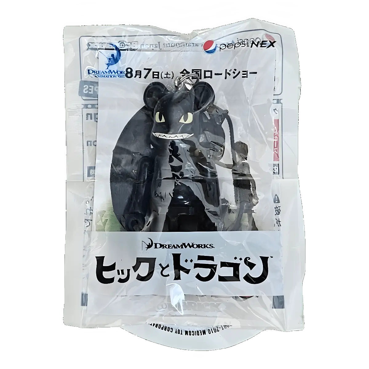 Bearbrick PEPSI.NEX × Paramount - How to Train Your Dragon - Toothless 70% in der Verpackung