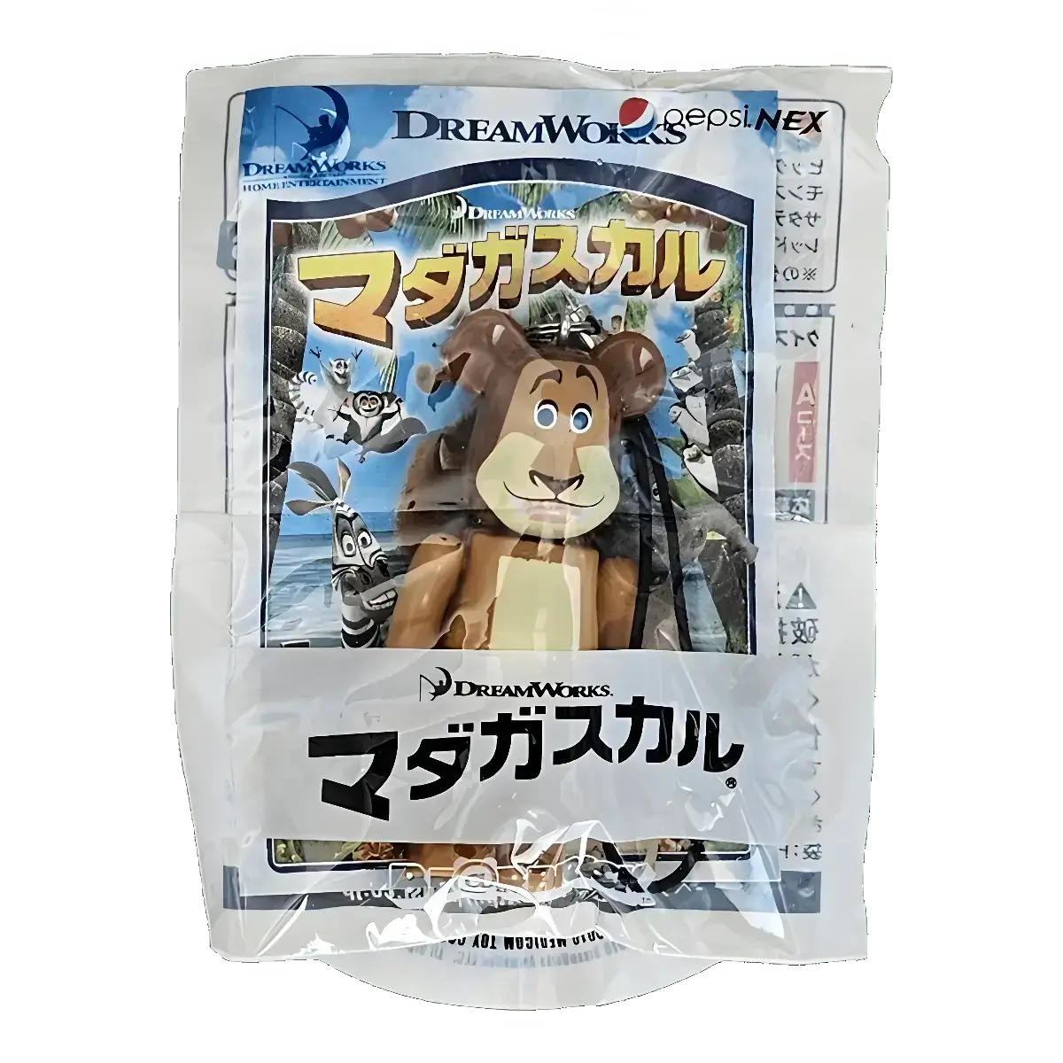Bearbrick PEPSI.NEX × Paramount - Madagascar 70% in der Verpackung